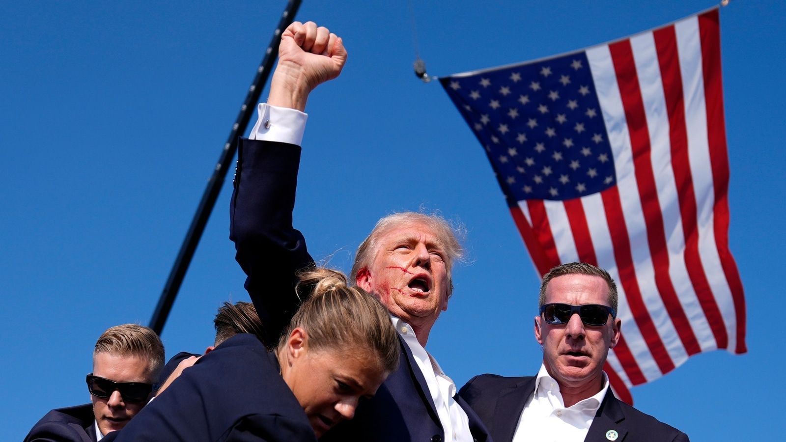 Trump rally shooting: Horrifying new clip shows cops with guns surrounding building, then gunfire erupting: Watch