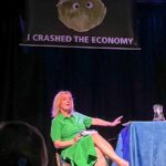 Watch: Liz Truss storms off stage after being trolled with ‘I crashed the economy’ banner