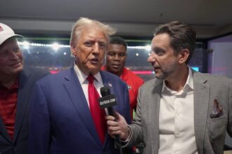 Outkick's Clay Travis interviews former President Trump at the Georgia-Alabama SEC clash