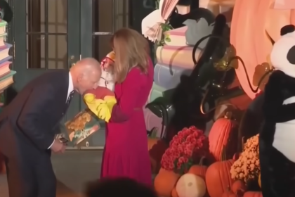 Biden Sees Baby In A Chicken Costume For Halloween, So Of Course He Pretends To Bite Him