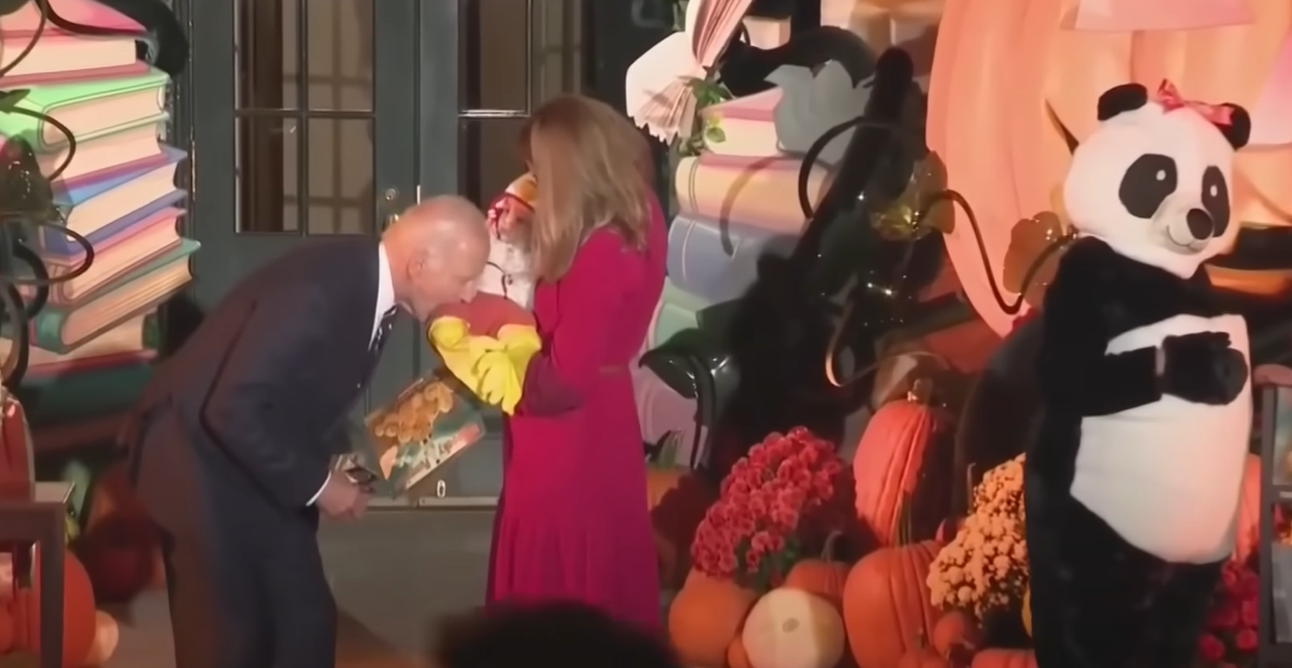 Biden Sees Baby In A Chicken Costume For Halloween, So Of Course He Pretends To Bite Him