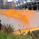 Climate activists protest Trump win, spray orange paint on US embassy in London