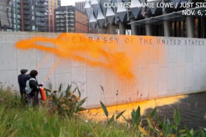 Climate activists protest Trump win, spray orange paint on US embassy in London