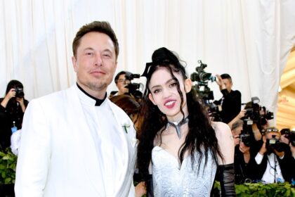 While Elon Musk Was Chainsawing at CPAC, Grimes Publicly Begged Him for Help With Their Child’s Medical Emergency