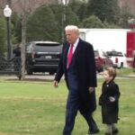 President Donald Trump and Elon Musk's son walk to Marine Force One in heart-warming video