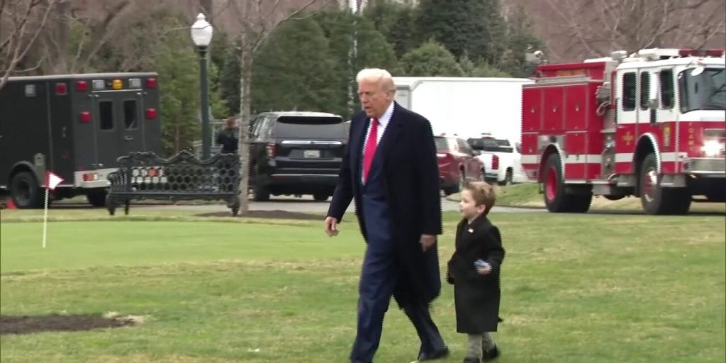 President Donald Trump and Elon Musk's son walk to Marine Force One in heart-warming video